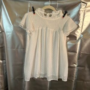 New in bag. White Blouse w/dot design